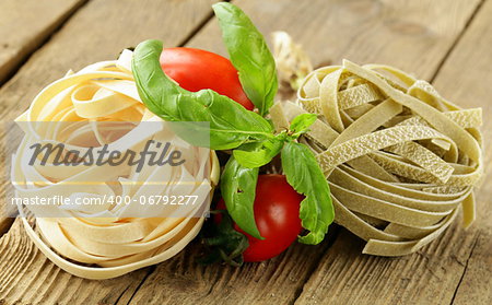 types of pasta on a wooden table