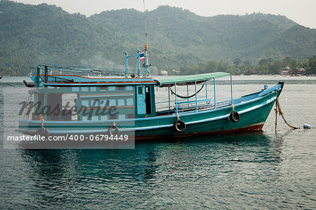 Green fishing boat in Thailand