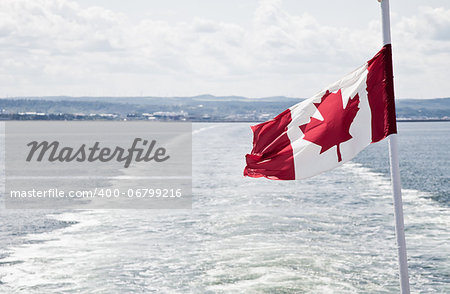 View of the sea and the flag of Canada