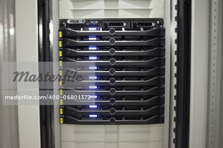 Close-up of a row of servers in a box in the hallway