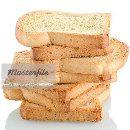 Several pieces of golden brown toast on white background.