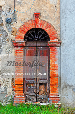 Wooden Ancient Italian Door in Historic Center