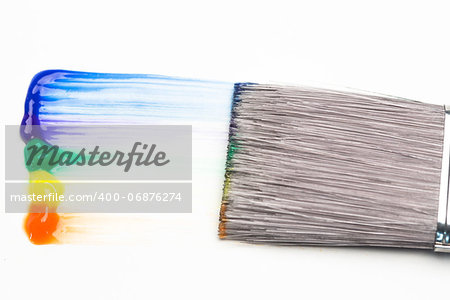 Paintbrush with rainbow brush stroke for gay pride on white background