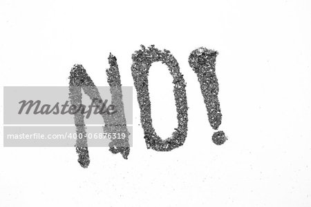 No with exclamation mark spelled out in ash on white background
