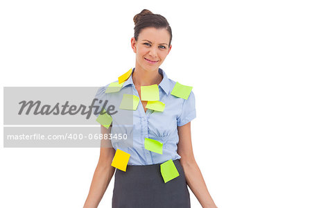 Smiling businesswoman with sticky notes
