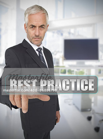 Businessman touching the term best practice in his office
