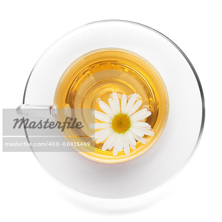 Cup of tea with chamomile flower. View from above. Isolated on white background