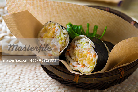 Closeup of a Malaysia popiah fresh spring roll  filling with turnip, Jicama, bean sprouts, grated carrots, tofu and chopped peanuts. Popiah fresh spring roll .