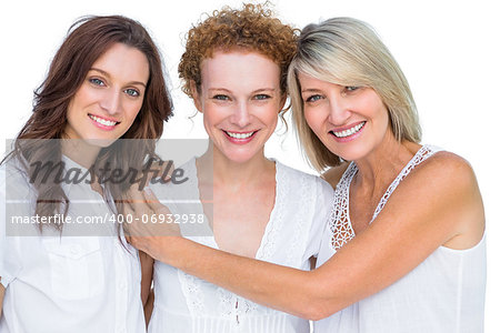 Beautiful models posing hugging each other on white background