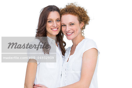 Two beautiful models posing on white background