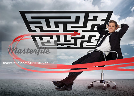 Businessman sitting in front of red arrow through qr code smiling at camera in swivel chair