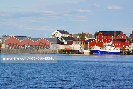 Industrial fishing port in Reine on Lofoten islands in Norway during summer