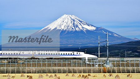A bullet train passes below Mt. Fuji in Japan.