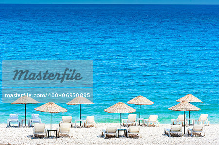 wicker beach umbrellas on the beach