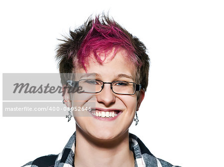 Close-up portrait of cool young expressive woman smiling in studio on white isolated background