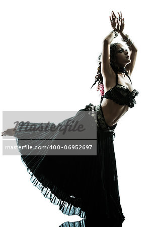 one arabic woman belly dancer dancing silhouette studio isolated on white background