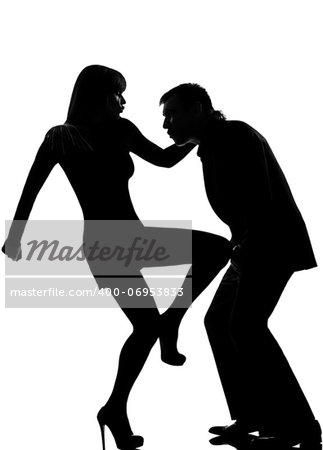 one caucasian couple man and woman self defense  domestic violence in studio silhouette isolated on white background