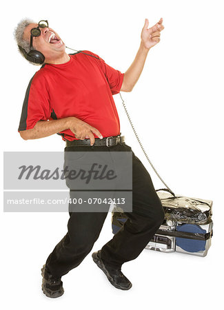 Happy man with big tape deck playing air guitar