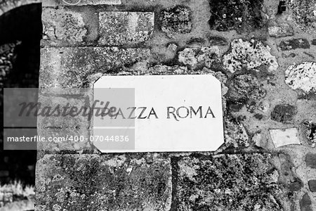 Monteriggioni, Tuscany, Italy. Street plate of the main square of the town.