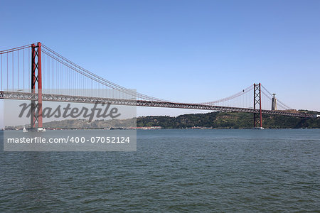 Ponte 25 de abril crossing Tejo river in Lisbon Portugal