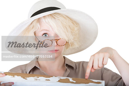 Nervous female tourist pointing at map on white background