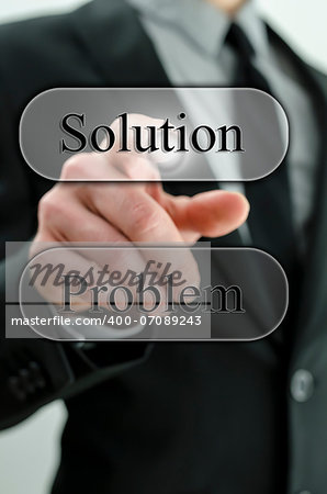 Businessman pressing Solution icon on virtual interface.