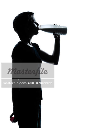 one caucasian young teenager silhouette boy or girl drinking milk  portrait in studio cut out isolated on white background