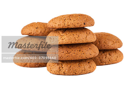 Three stacks of oatmeal cookies isolated on white background