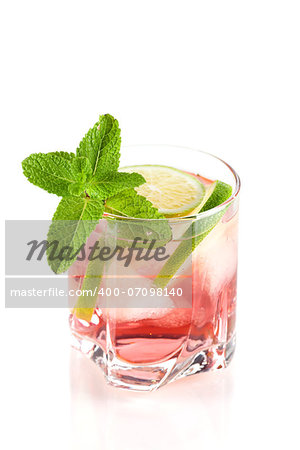 Pink alcohol cocktail with lime slices and mint isolated on white background