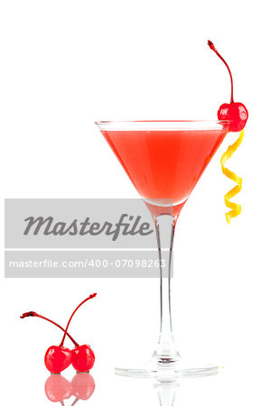 Alcohol cocktail with orange juice and grenadine with two cherry isolated on white background