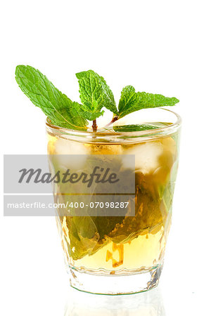 Alcohol cocktail with whiskey and mint isolated on white background