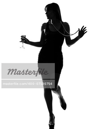 stylish silhouette caucasian beautiful woman partying drinking champagne flute glass cocktail full length on studio isolated white background