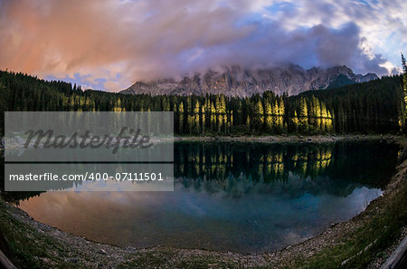 Karersee night view and Mount Latemar with clouds, Dolomiti - Italy