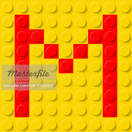 Red letter M in yellow plastic construction kit. Typeface  sample.