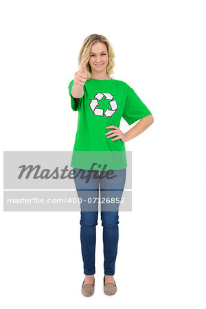 Happy blonde environmental activist giving thumb up to camera on white background
