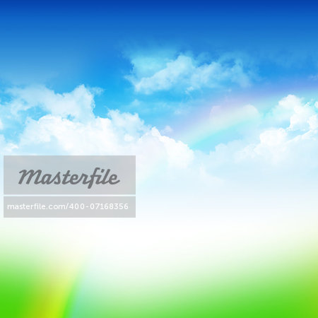 Cloudy blue sky with rainbow and green field abstract background