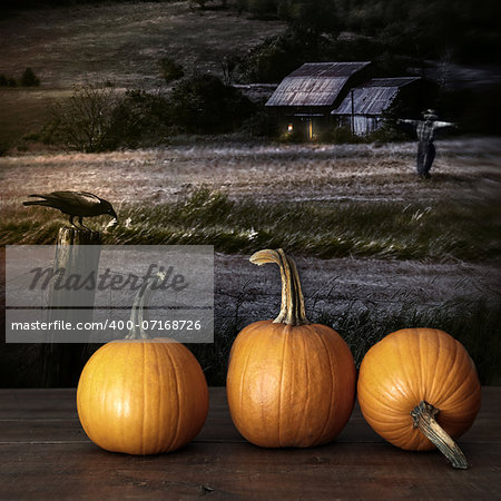 Pumpkins left on table at night time