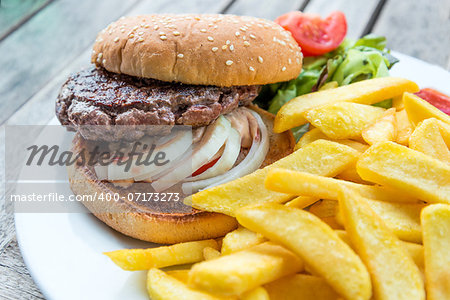 Cheese burger - American cheese burger with fresh salad