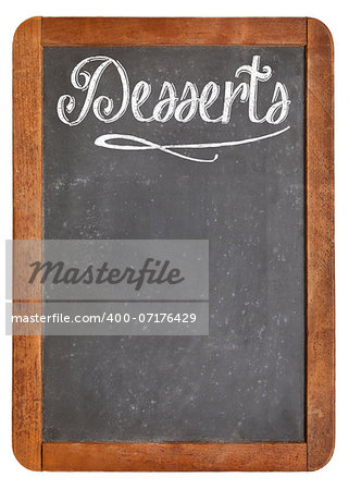 desserts - vintage slate blackboard in wood frame  with white chalk smudges used a restaurant menu