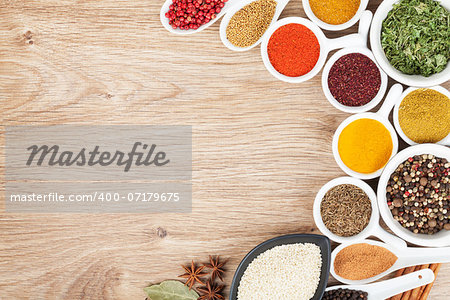 Various spices selection on wooden table