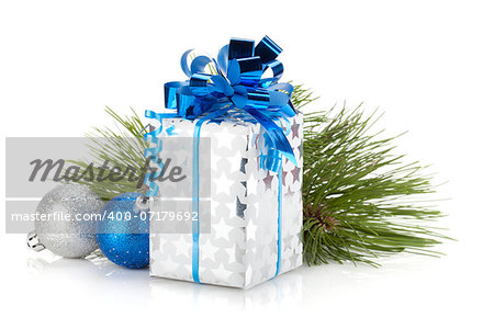 Christmas gift box and blue baubles. Isolated on white background