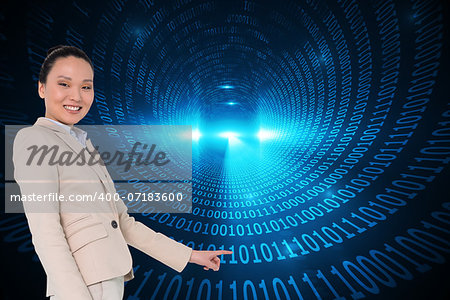 Composite image of smiling asian businesswoman pointing