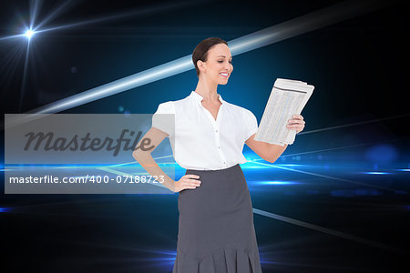 Composite image of cheerful stylish businesswoman holding newspaper while posing