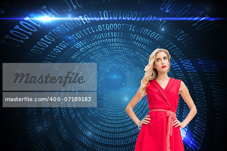 Composite image of elegant blonde standing hands on hips in red dress