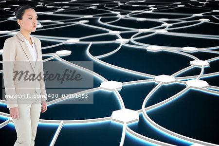 Composite image of unsmiling asian businesswoman walking