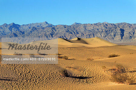 Sand Dunes, Ripples And Mountain Peaks, Death Valley National Park, California