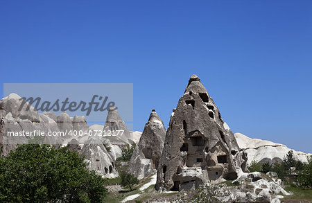 Cave houses and church. Turkey, Cappadocia, Goreme.