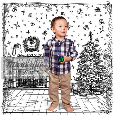 Cute baby in Christmas, standing with toys in his hands