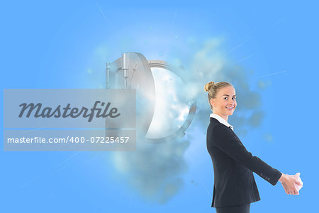 Composite image of happy blonde businesswoman looking at camera