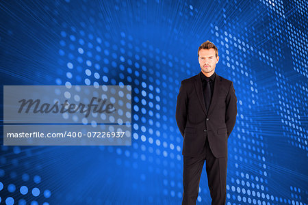 Composite image of young businessman looking seriously at the camera